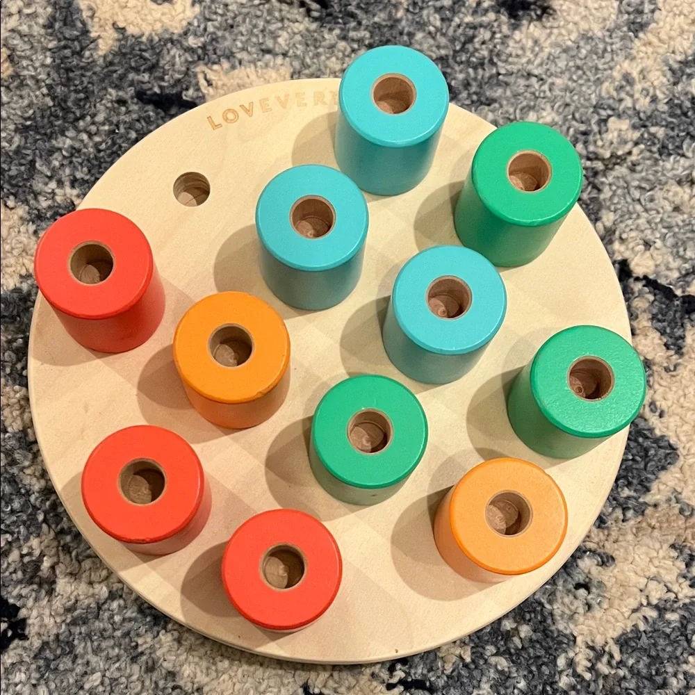 Colorful Peg Board by Lovevery